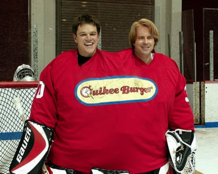 Conjoined twins in ice hockey uniform