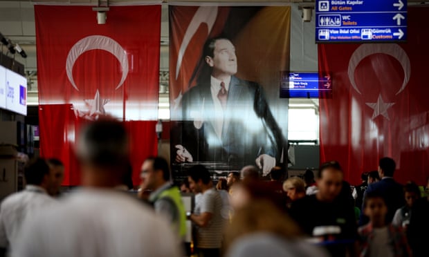 Passengers queue at Atatürk airport after air traffic returned to normal following the terror attack in Istanbul.