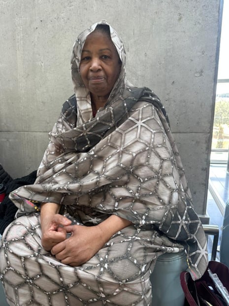 Mother of three Hadija waiting to board a charter plane bound for Britain at Larnaca International Airport.