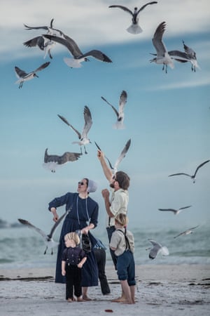 An Amish family feeding gulls