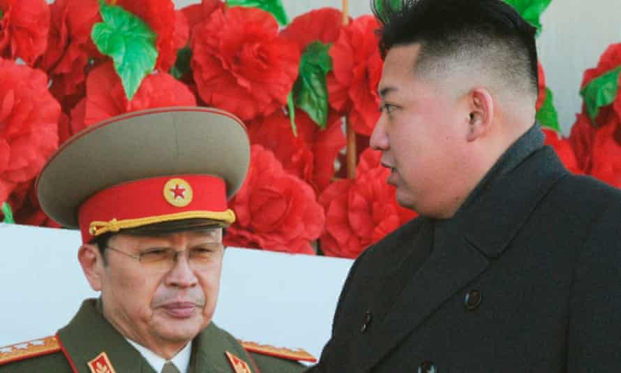 Kim Jong-un with his uncle Jang Song-thaek, a year before he was executed.