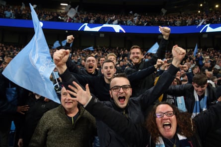 Manchester City football fans celebrate before a winning goal is ruled out by VAR decision during the UEFA Champions League Quarter Final second leg match against Tottenham Hotspur at at Etihad Stadium on April 17, 2019