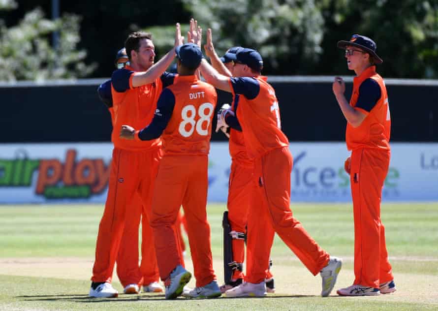 Paul van Meekeren celebrates with teammates after taking the wicket of England’s Phil Salt.