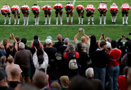 The Japan players bow to the applauding crowd after their 62-19 defeat to New Zealand.