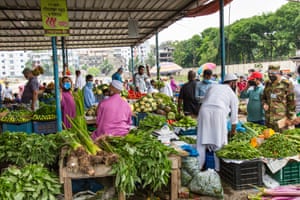 Shoppers at an open-air market