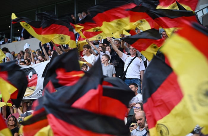 Germany fans with flags in the stadium before the game.