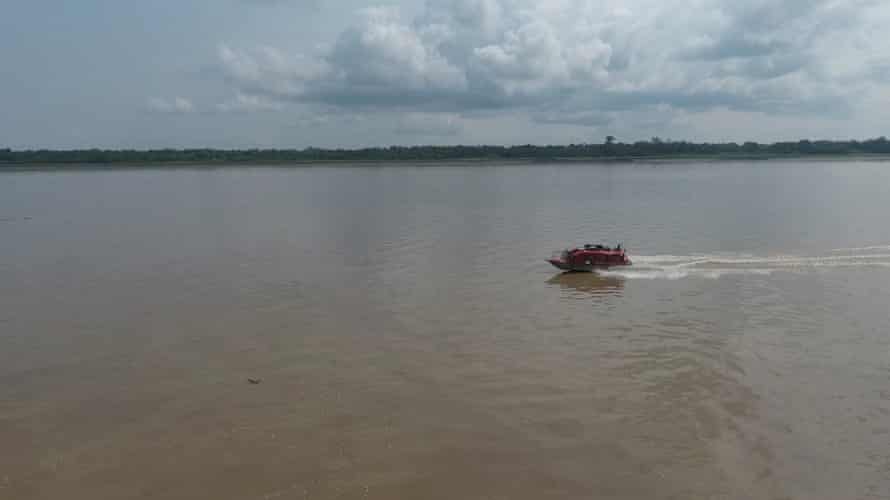 The boat used by teams detecting and treating HIV and AIDS, seen on the river.