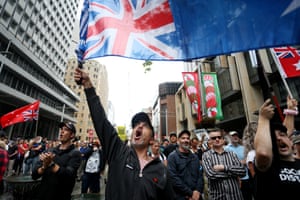 Crowds in Sydney protest against mandatory vaccinations and lockdown measures on Saturday.