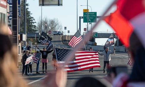 Residents in Blaine, Washington, show support for Canadian protesters across the border. Convoys have formed around the world with varying degrees of success.