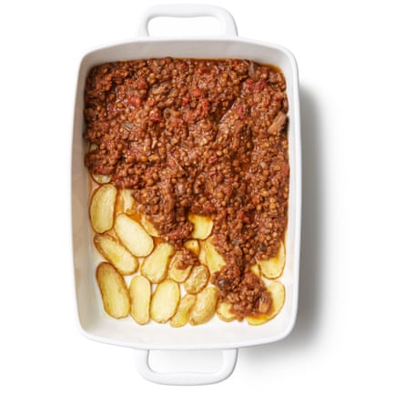 Felicity Cloake’s Vegan Moussaka. Lightly grease the base of a medium baking dish, then cover with the potatoes and season lightly with salt and a teaspoon of oregano. Spoon over the sauce.