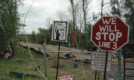 Protest signs at Fire Light Camp, where Dawn Goodwin leads a four-day prayer ceremony.