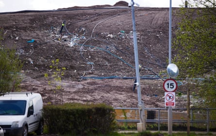 Walleys quarry landfill site rises above a car park