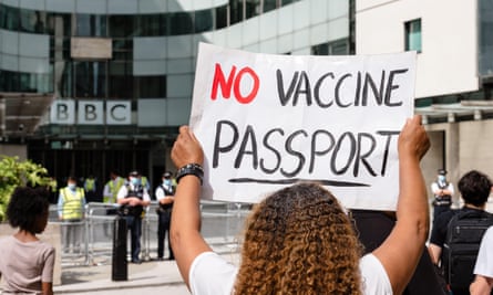 An anti-vaccine protestor outside BBC headquarters. 