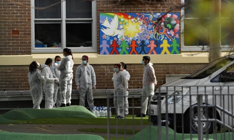 Workers conduct a deep Covid clean at Carlton public school in Sydney on 23 August. A report published by the National Centre for Immunisation Research and Surveillance has found only 2% of children who contract coronavirus require hospitalisation.