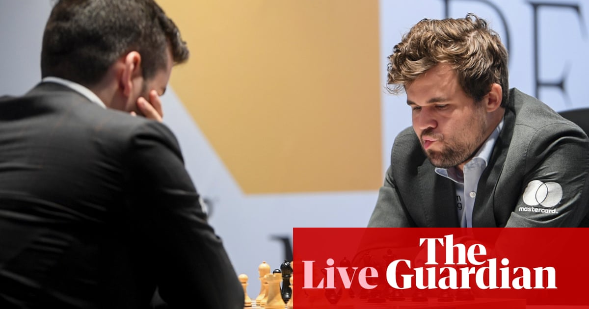 Magnus Carlsen beats Ian Nepomniachtchi to retain World Chess Championship title – live!