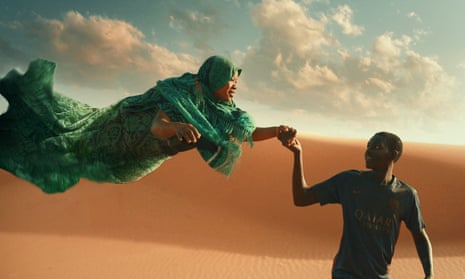 Seydou Sarr with then floating woman he hallucinates as he travels through the Sahara in a still from Io Capitano.