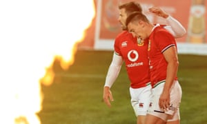 Josh Adams of British and Irish Lions celebrates with teammate Elliot Daly after scoring his team’s seventh try.