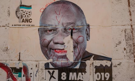 A defaced election poster of President Cyril Ramaphosa in Johannesburg.