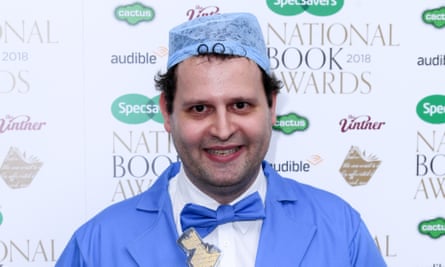 Adam Kay in swabs at a book award ceremony