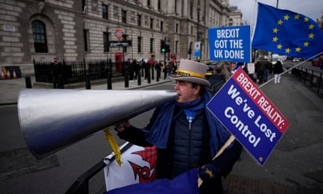 An anti-Brexit protester demonstrates on the edge of Parliament Square, close to the House of Commons, on December 8, 2021.