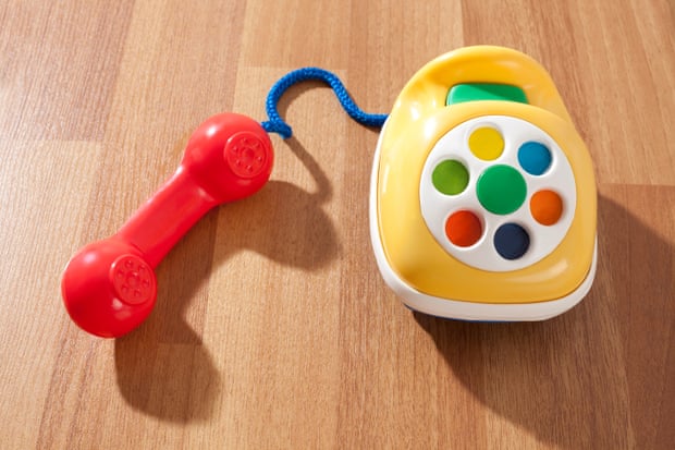 A colourful toy phone. 