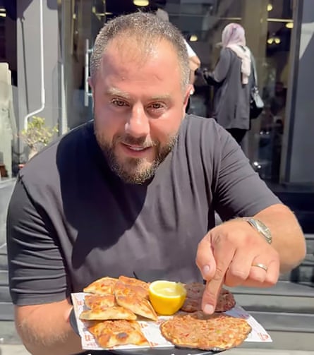 Dib points to a plate of food.