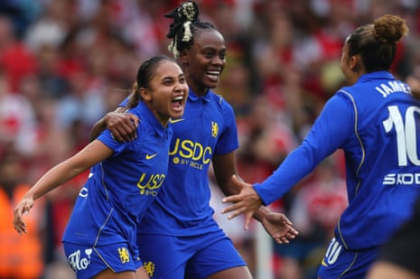 Alyssa Thompson and Melvine Malard celebrate towards teammate Lauren James