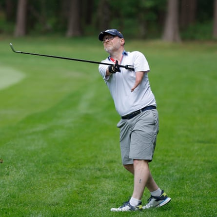 Tony Lloyd, from Shropshire, who was born with bilateral upper limb phocomelia (elbow-length arms with no hands) and who uses extra long clubs with the grip tucked into his left armpit, plays a shot into the eighth green