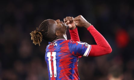 Wilfried Zaha celebrates the end of Crystal Palace's 2-1 win over Wolves last October.