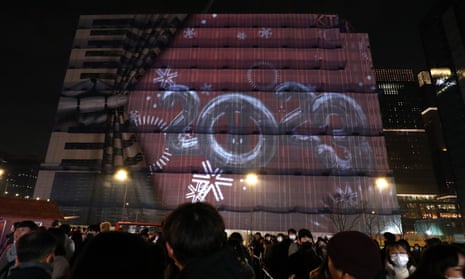 Members of the public gather to celebrate New Year's Eve at the Gwanghwamun Square.