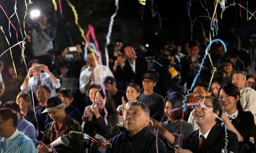 Fans of the Japanese writer Murakami celebrating in Tokyo in 2018, after they heard that Japanese-born Kazuo Ishiguro won the Nobel prize. Murakami fans are known to gather each year in the hopes he will win.