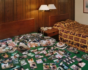 The Coachlight. Mitchell, South Dakota, 2020 . Many photos on floor of motel room