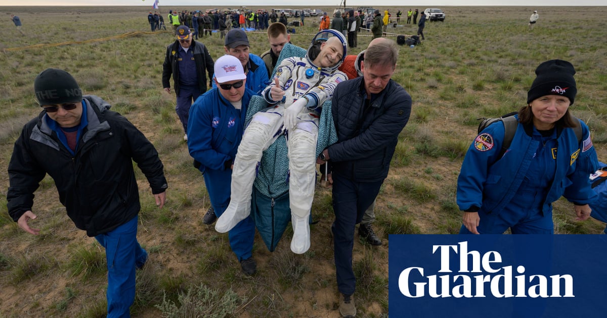 Nasa's oldest astronaut celebrates 70th birthday with return to Earth