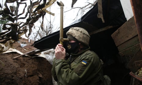 A Ukrainian soldier on the frontline with Russia-backed separatists in Donetsk region, 12 April 2021.