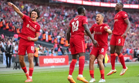 Liverpool celebrate the third goal of the game.