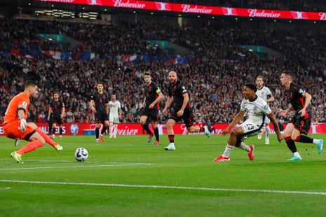 England debutant Myles Lewis-Skelly shoots and scores during the FIFA World Cup 2026 European Qualifier between England and Albania at Wembley Stadium.