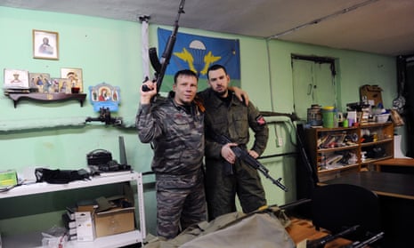In this 2015 photo, Dmitry Gaydun and Sergei Zinchenko, two members of the Russian Imperial Movement, are shown at a training base in St Petersburg.