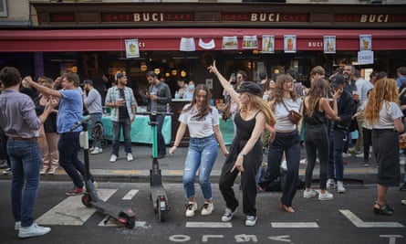 Parisians dance in the street at Fête de la Musique, 21 June.