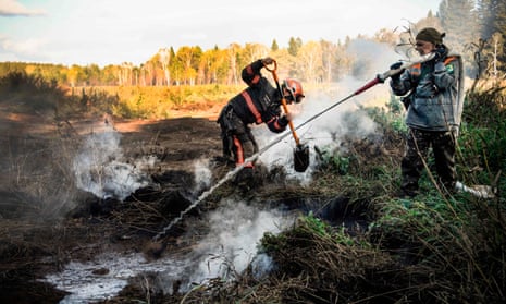 Greenpeace and local activists extinguish a peat fire near Novosibirsk, Siberia.