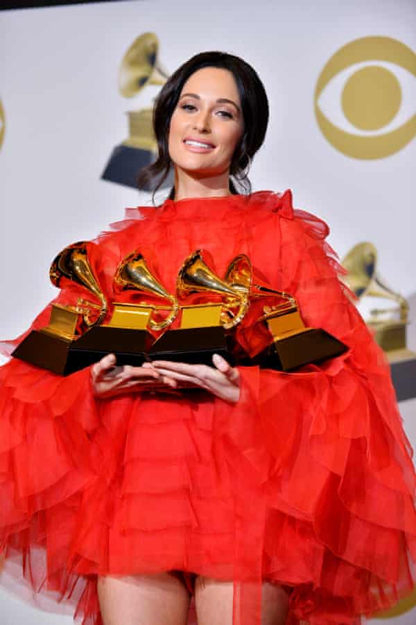 Kacey Musgraves with her four awards.