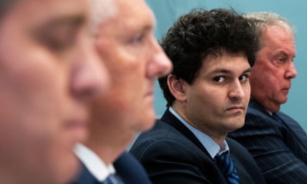 Sam Bankman-Fried, centre, testifying before the House Agriculture Committee in the US last May.