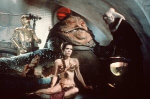 Carrie Fisher with C-3PO and Jabba the Hutt on the set of Star Wars: Episode VI – Return of the Jedi in 1983