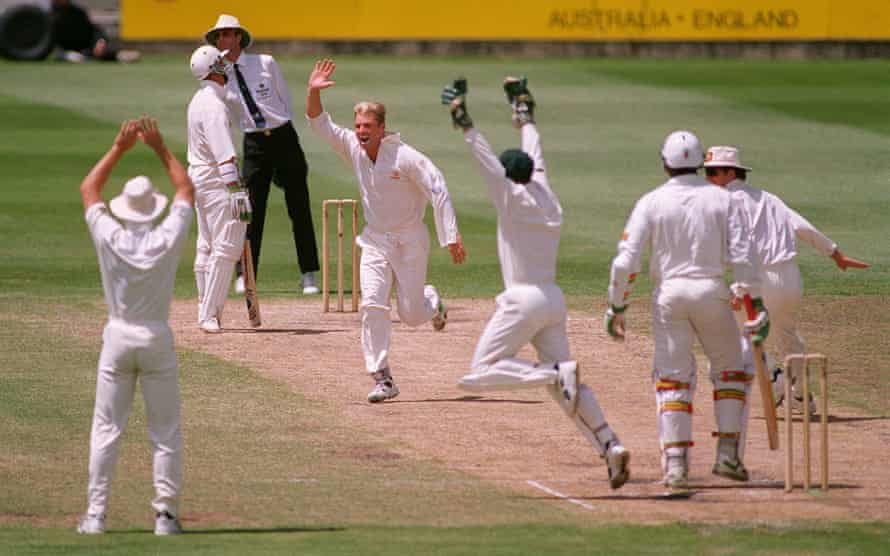 The Australian players celebrate as spinner Shane Warne takes the third wicket of his hat trick, that of English tailender Devon Malcolm during the Second Test of the 1994/95 Ashes series.