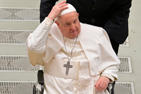 Pope Francis gestures during the weekly general audience at the Vatican on 17 January.