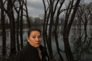 Shelly Saunsoci, who is both the vice-chair of the community and the tribal employment rights director, in Swan Lake, SD. “We feel like we are all alone,” says Saunsoci. She has been organizing flood relief with no help from FEMA, the federal or state government.