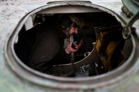 Ukrainian service personnel of the 80th Brigade prepare to fire a mobile howitzer outside Bakhmut.
