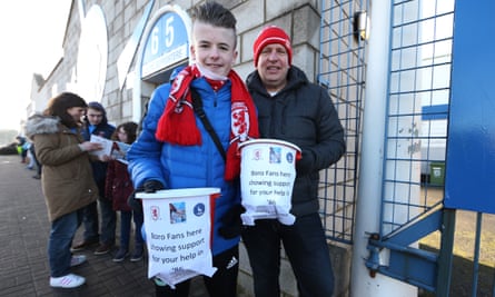 Middlesbrough supporters with collection buckets show their solidarity with the neighbouring club where Brian Clough cut his managerial teeth.