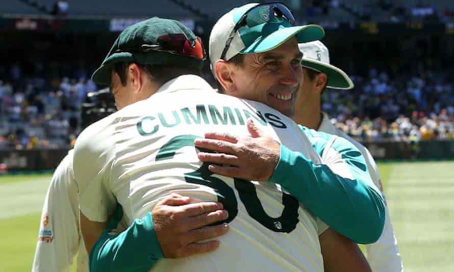 Langer embraces Pat Cummins following Australia’s decisive victory in the third Test