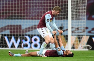 Aston Villa’s Trezeguet and Matt Targett celebrate after the match.