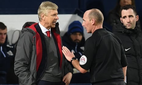 Arsène Wenger argues with Mike Dean after the referee handed a late penalty against Arsenal in their 1-1 draw with West Bromwich Albion on Sunday
